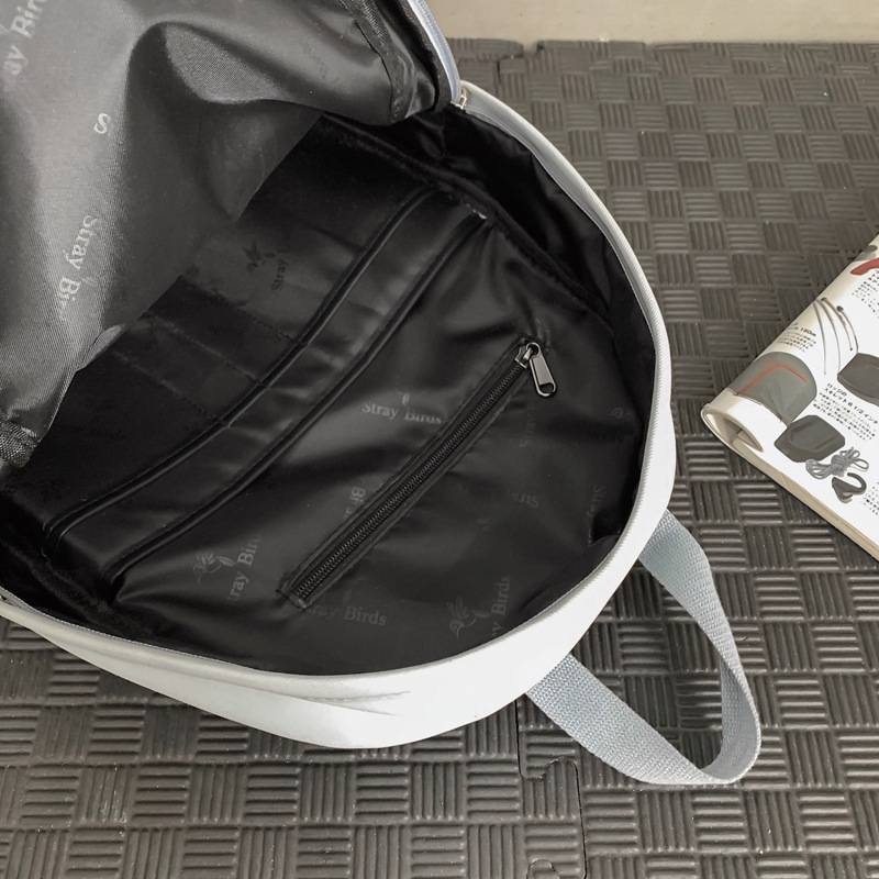 The 2025 new solid-color simple backpack is a versatile, simple, casual and fashionable Korean-style commuting backpack for college students Application Scenario