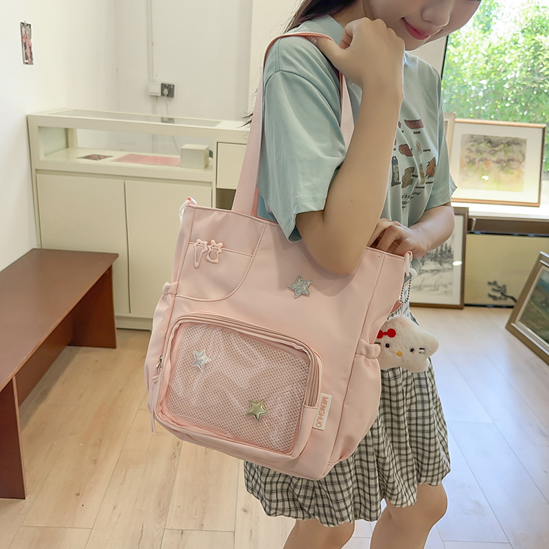 Summer new single-shoulder bag for female primary school students, solid color macaron school bag, high appearance level, sweet girl, cute, smacking pain bag full figure