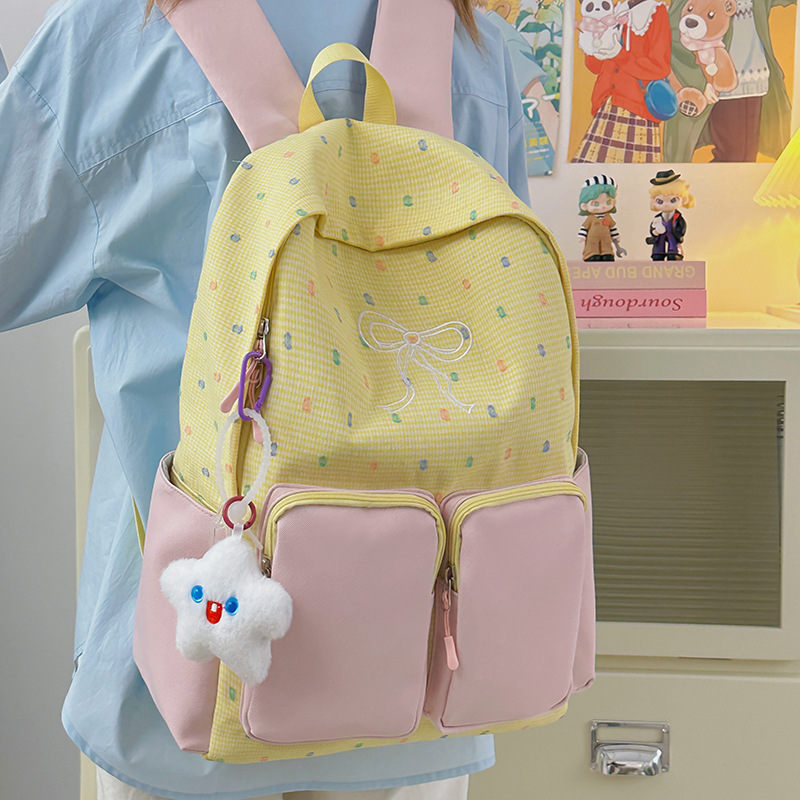 A Japanese-style ins academy style college student schoolbag with a high appearance level, sweet and girlish heart, and a fresh bow tie backpack full figure