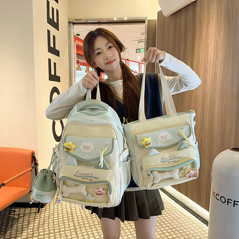 2025 New school style cute backpack, high appearance level, large-capacity multi-compartment schoolbag, lightweight color-blocking tutorial bag details Picture