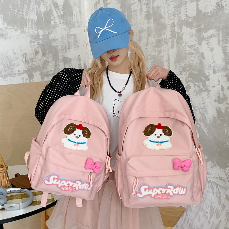 A new high-appeal Japanese-style Instagram fresh and cute puppy backpack for women, casual, simple, lightweight and large-capacity backpack full figure