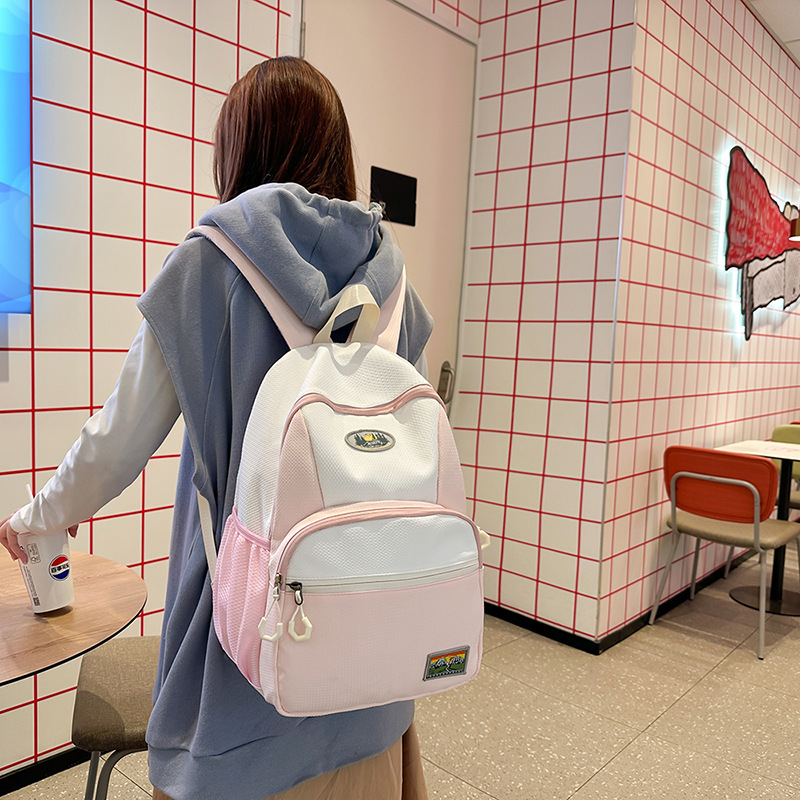 Large-capacity Japanese schoolbags for junior and senior high school students, fashionable color-blocking niche design backpacks, and American retro versatile backpacks details Picture