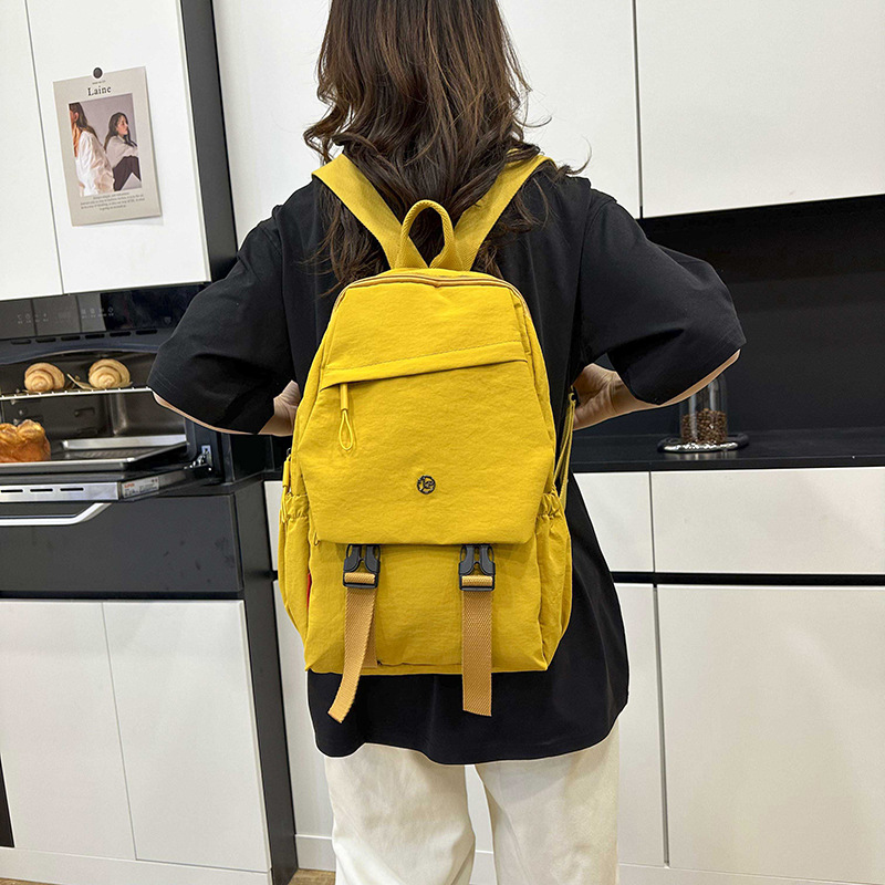 A new, simple and versatile backpack with a large capacity, unique and niche schoolbag. It is water-resistant and lightweight for spring outings and travel full figure