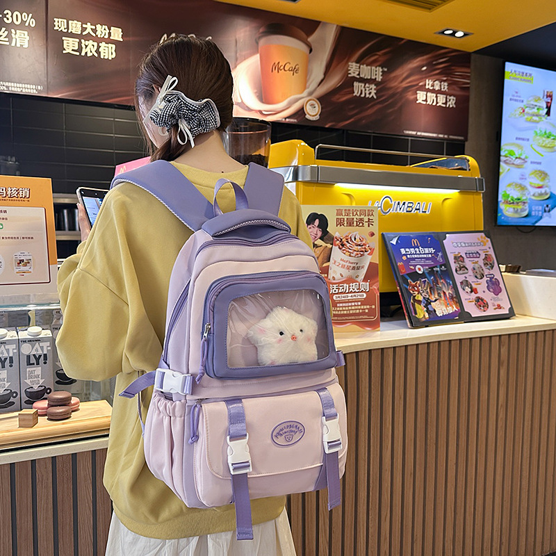 The 2025 new high-appearance-level, large-capacity, multi-compartment backpack for junior and senior high school students is versatile, casual and sweet full figure