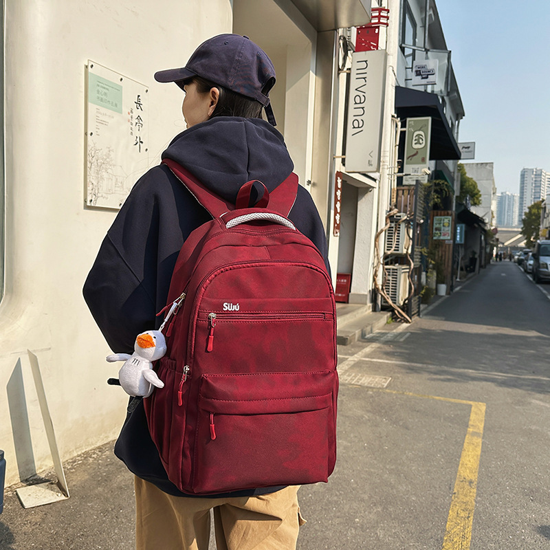 Large-capacity dark-patterned schoolbag, design sense backpack for junior high school students, wide shoulder strap computer backpack for high school and college students, couple details Picture