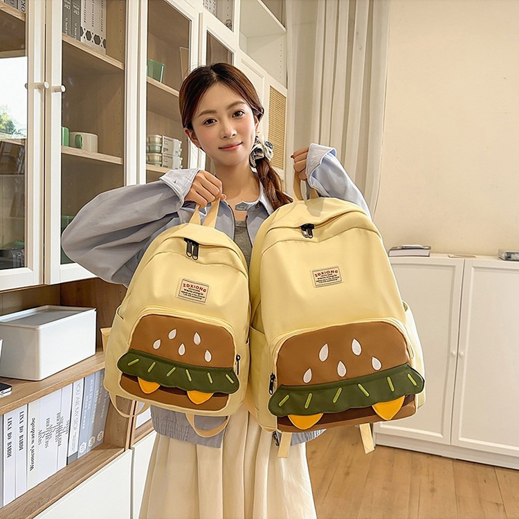 ins Burger's cute and unique design schoolbag is cartoonish and versatile. It's a lightweight travel backpack for college students and a casual backpack full figure