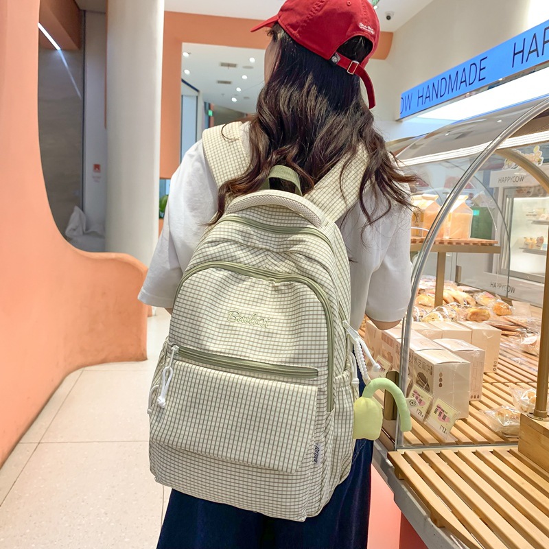A large-capacity backpack in a pastoral style for girls, a light and refreshing travel backpack, and a forest-themed schoolbag for junior high school girls full figure