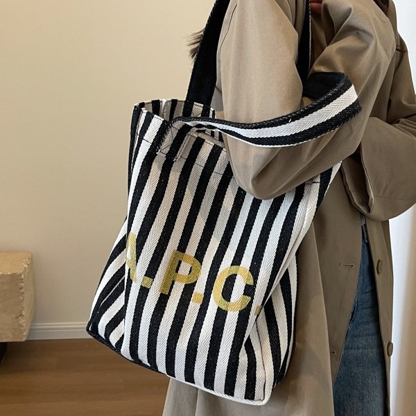 Commuter large-capacity striped canvas bag, 2024 new style women's bag, popular and versatile single-shoulder bag, college student tote bag full figure