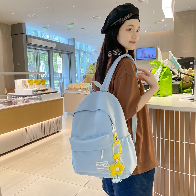 The new Korean version of Harajuku ulzzang junior and senior high school student backpack is a solid-color, fresh, cute and simple backpack details Picture