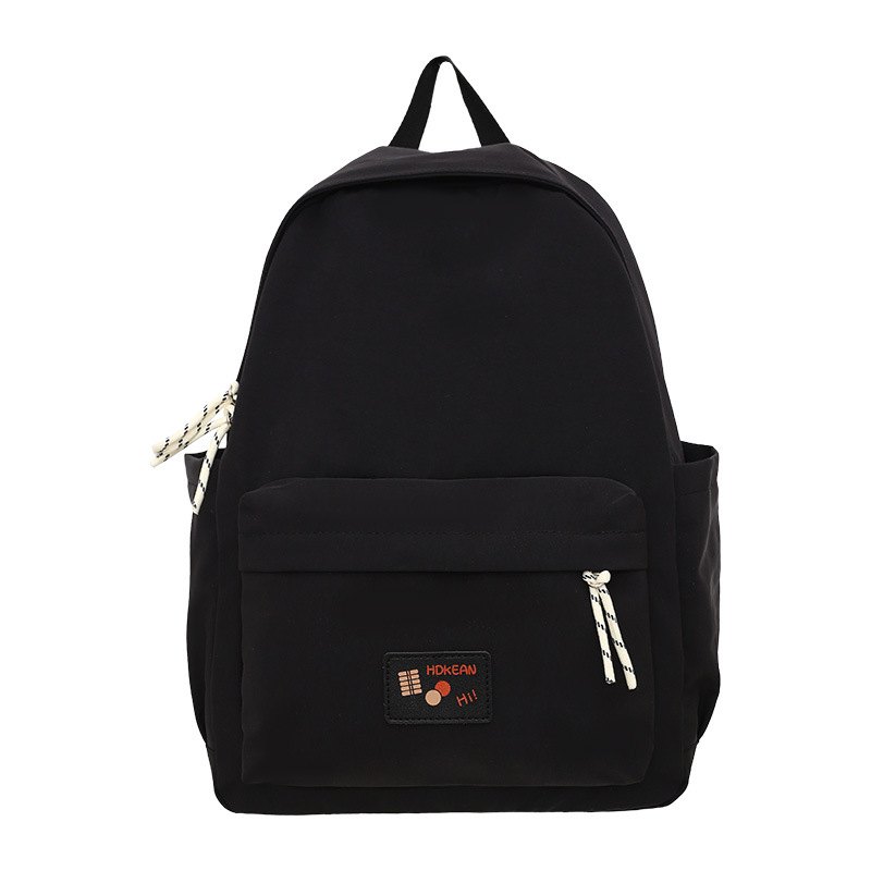 Simple and versatile casual small schoolbag, a backpack for girls in high school, college and junior high school, a lightweight backpack for commuting and traveling Item Picture
