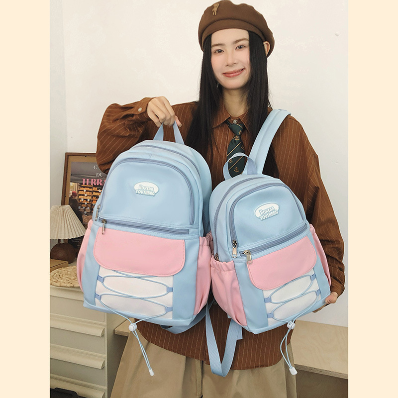 2025 New lightweight travel backpack, Korean-style nylon water-resistant backpack, simple schoolbag in various sizes details Picture