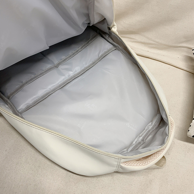 High-appearance-level Korean InS-style solid-color backpacks for junior and senior high school students, large-capacity transparent smudged pain bags for girls Application Scenario