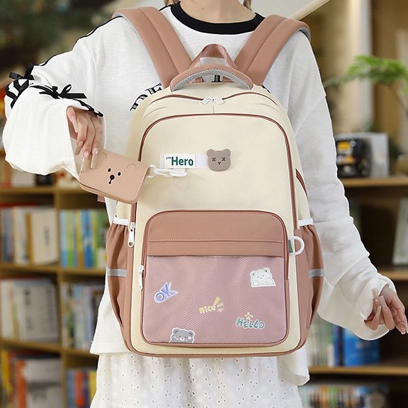 A new Korean version of the forest-themed ins fresh and sweet color-blocking backpack, a lightweight and large-capacity backpack for junior and senior high school students full figure