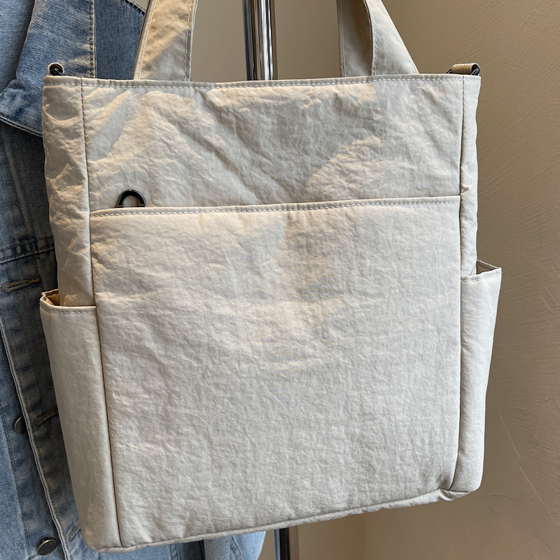 A new Japanese-style ins multi-pocket tote bag, a women's artistic sail bag, and a single-shoulder crossbody bag for students' classes Specification drawing
