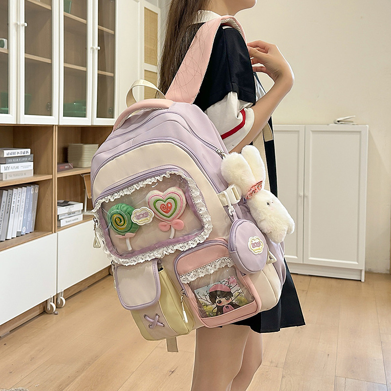 A new Japanese-style high-appearance-level ins pain bag for junior and senior high school students, featuring cute color-blocking and large-capacity backpacks full figure