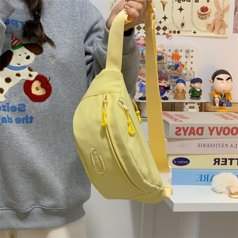 Solid-color ins single-shoulder bag, chest bag, versatile for student travel, Japanese niche solid-color crossbody bag, women's Harajuku style waist bag details Picture