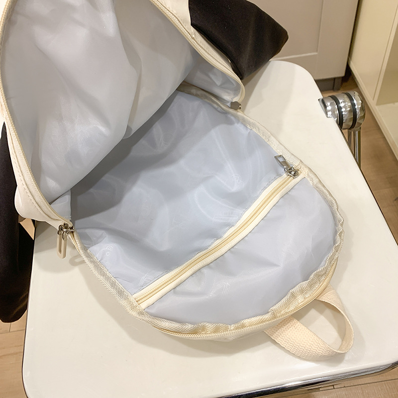 Cute puppy cartoon backpack, super cute and funny, large-capacity schoolbag, versatile travel bag, and niche backpack Application Scenario