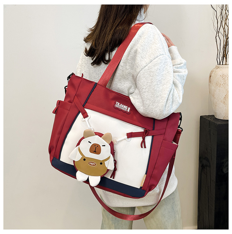 2025 New school-style cartoon single-shoulder tutorial bag, large-capacity casual handbag, cute commuter crossbody bag full figure