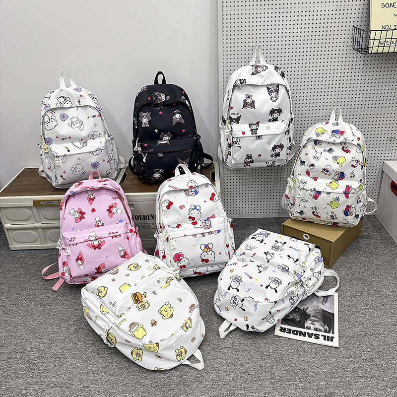 The new Japanese-style ins trendy backpack features a large capacity, cute dolls and a high level of appearance for junior and senior high school students full figure