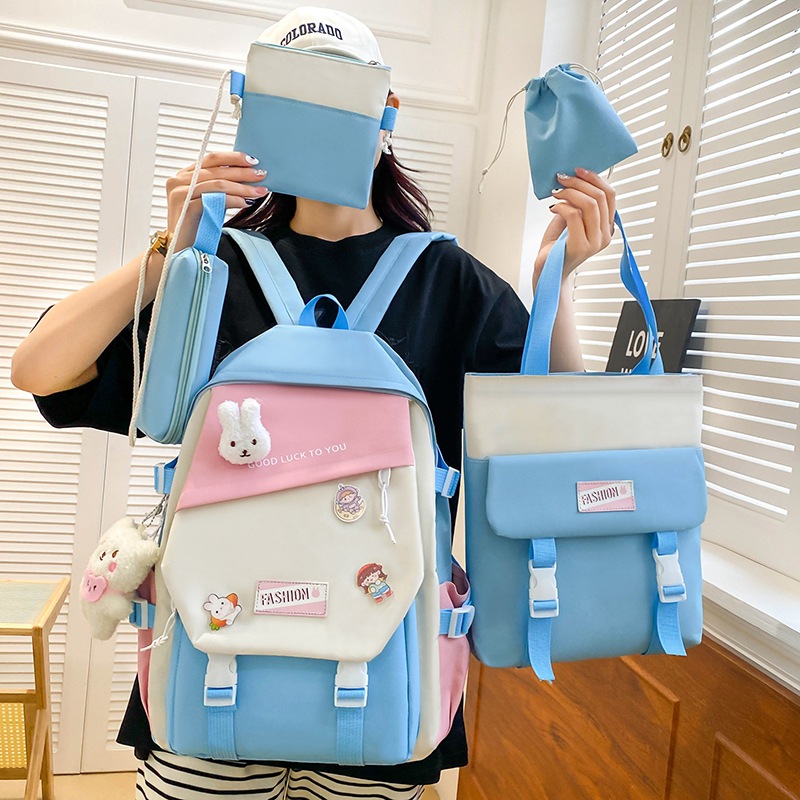 A fresh and fashionable color-blocking schoolbag for girls, a backpack for primary and junior high school students, a five-piece campus set of canvas casual backpack full figure
