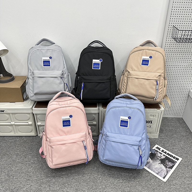 College-style backpack, simple, fashionable and artistic Korean style, large-capacity schoolbag for junior and senior high school, backrest and burden reduction travel backpack full figure
