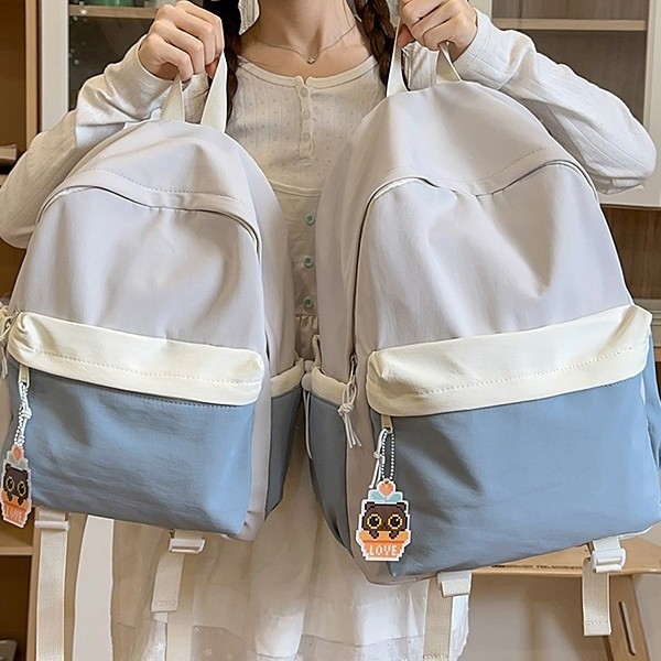 A new high-appearance-level Japanese-style fresh and sweet color-blocking backpack, a lightweight and large-capacity backpack for junior and senior high school students details Picture
