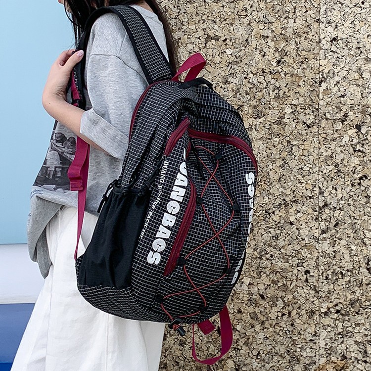 A new high-appeal color-blocking drawstring letter backpack for both men and women, a light and fresh backpack for junior and senior high school students to commute details Picture