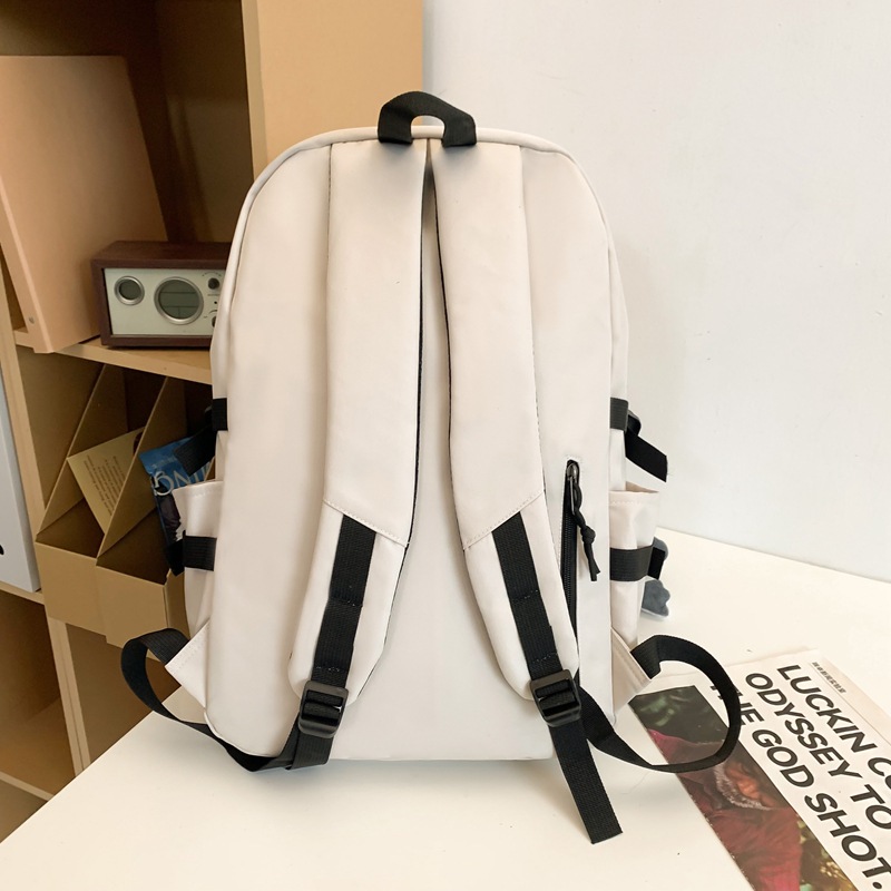 A Korean-style trendy college student couple casual backpack with a simple and casual large-capacity middle school student backpack Application Scenario