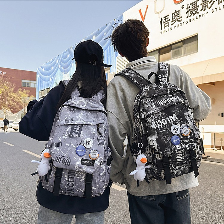 New 2025 niche design graffiti schoolbag for middle and high school students, men's high-end style, large-capacity multi-compartment backpack details Picture