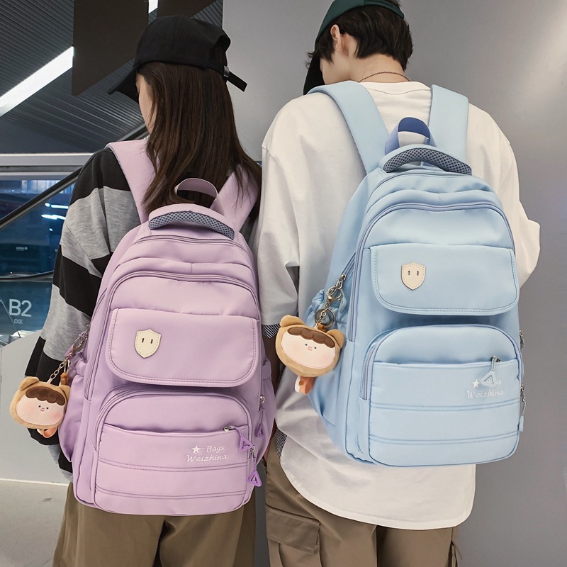 New large-capacity schoolbag in the style of a girl's school, a Korean version of a backpack for junior and senior high school students, and a simple college student schoolbag full figure