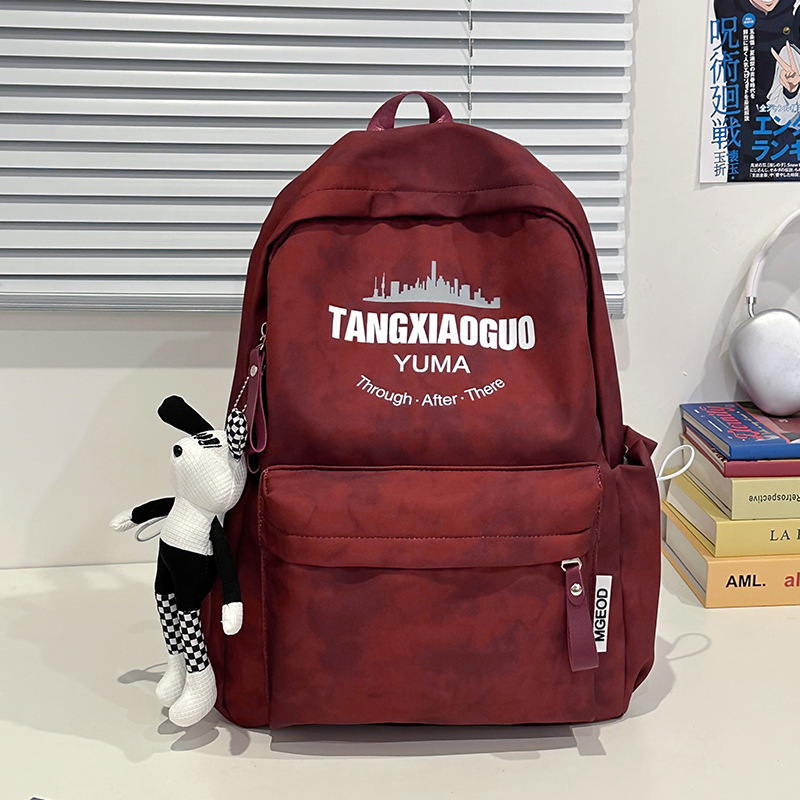 A simple, original and niche tie-dyed schoolbag designed for female college students on both shoulders. It is a versatile large-capacity backpack for women Application Scenario