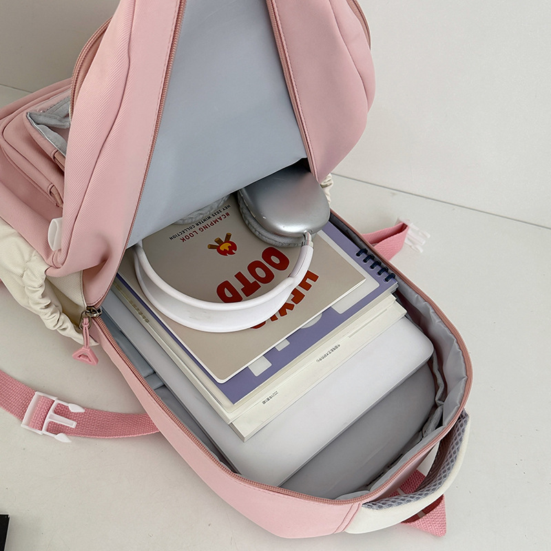 A new high-appeal, fresh and sweet color-blocking backpack from Korean Instagram, a lightweight and large-capacity backpack for junior and senior high school students Application Scenario