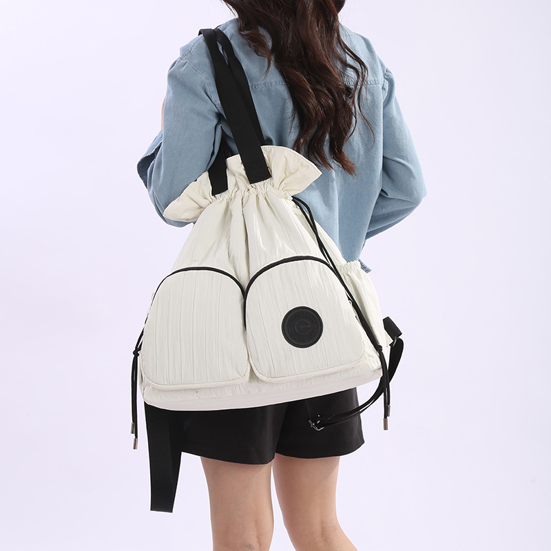 The new summer casual and lightweight backpack is versatile, with a large capacity for sports, fitness and travel, and a simple commuting single-shoulder bag details Picture