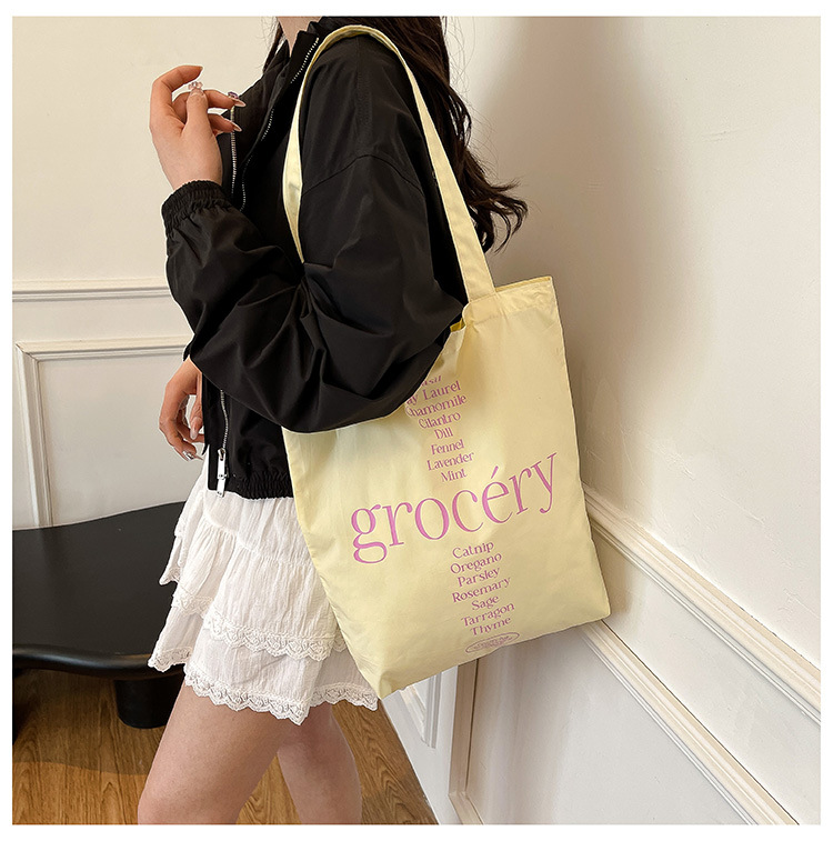 A new high-appeal, fresh and simple letter-printed handbag for women. It's a versatile and large-capacity crossbody bag for work and commuting details Picture