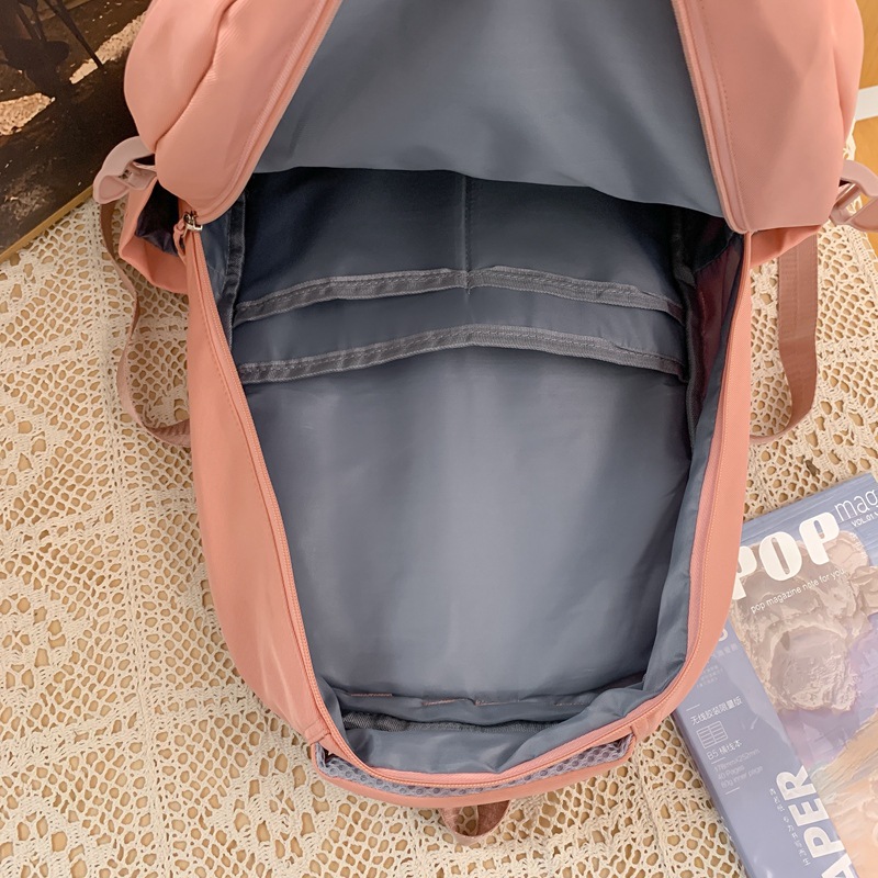 New schoolbag for female college students, solid-color large-capacity backpack, multi-layered and sturdy backpack for junior and senior high school students Application Scenario