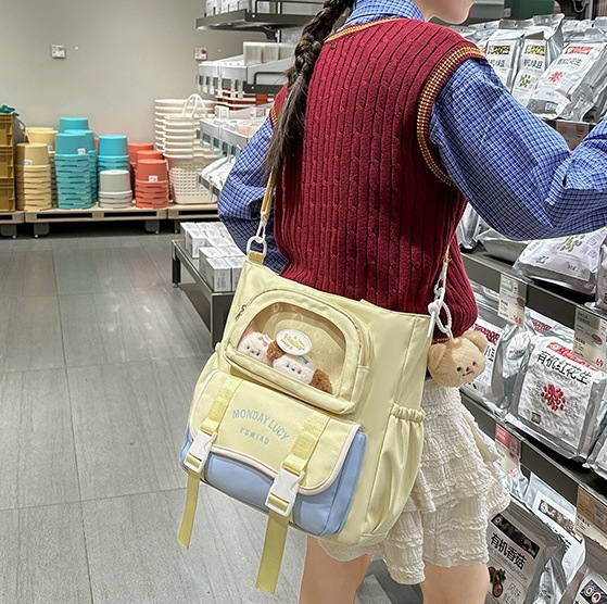 Cute color-blocking hand-held shoulder bag, large-capacity crossbody bag, a casual commuting bag for female college students attending classes, and a make-up class bag full figure