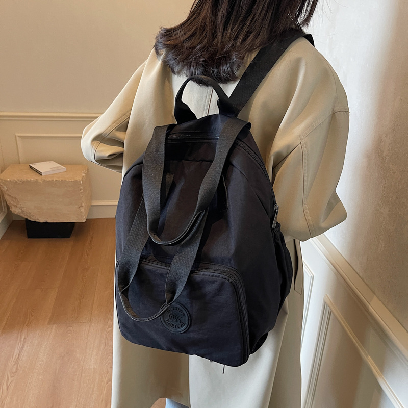 The new foldable backpack for women, a large-capacity travel backpack, a student schoolbag, is lightweight and versatile, and a trendy single-shoulder handbag full figure