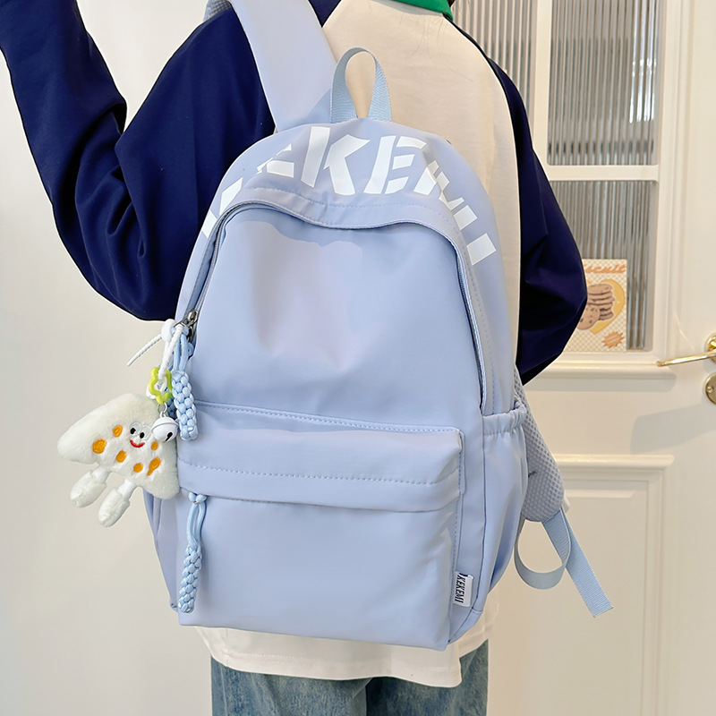Japanese-style simple and versatile large-capacity solid color school backpack, new Spring 2025 lightweight commuter student backpack details Picture