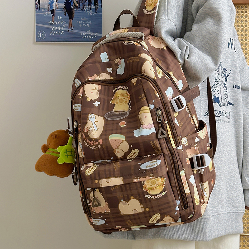 Japanese-style ins girl cute cartoon printed schoolbag with high appearance level, lightweight backpack for primary school students in grades 3 to 5 full figure