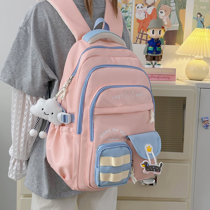 The new ins school style backpack is a cute, simple and lightweight commuting backpack for primary school students in grades 3 to 6 and junior and senior high school students details Picture
