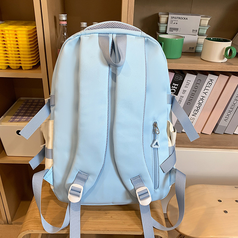 The new high-appearancelevel college style backpack for junior and senior high school students features a simple, lightweight and versatile color contrast three-piece set with a large capacity Specification drawing