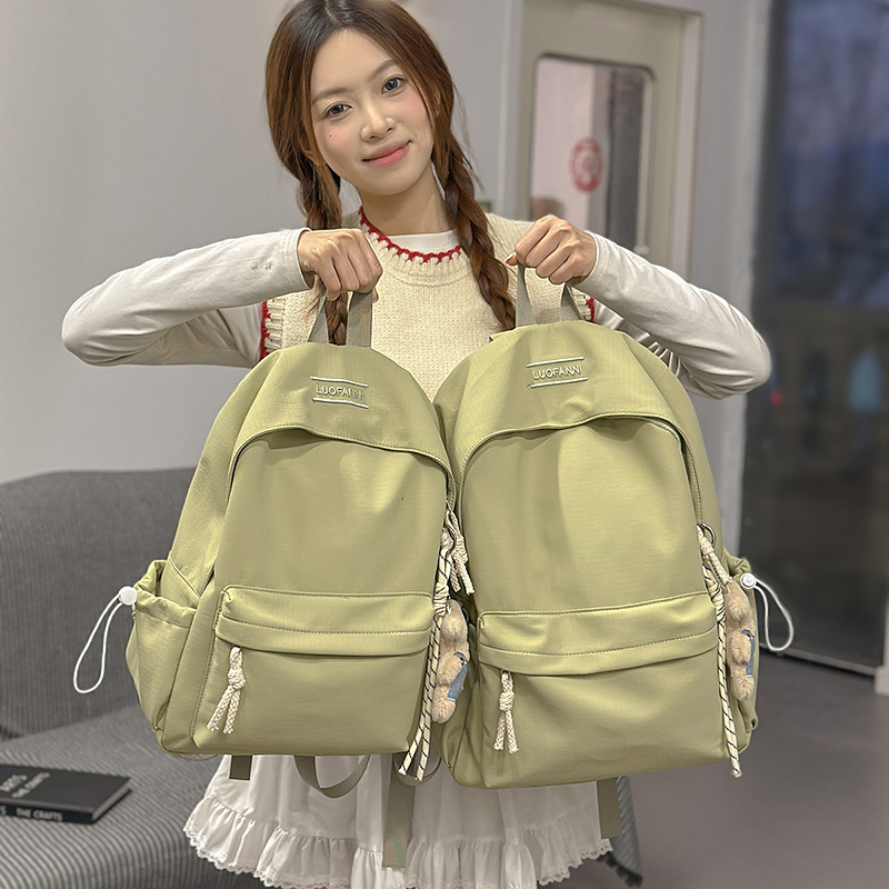 The new Japanese-style simple and lightweight college student backpack is versatile, with a high appearance level and large capacity. It is a solid color backpack for casual travel details Picture