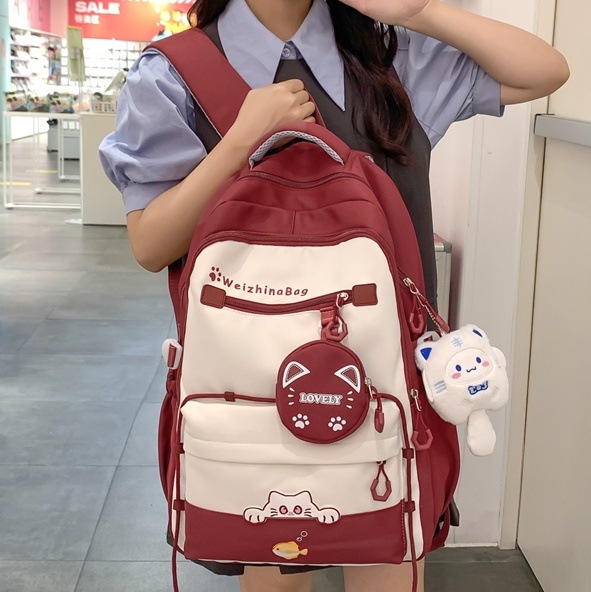 High-quality and versatile schoolbag for junior high school girls, a light and cute Japanese-style high school student backpack with contrasting colors full figure