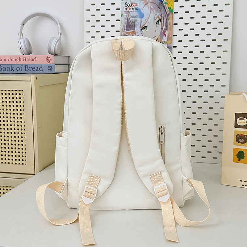 A new Japanese-style backpack with a high level of appearance, fresh and sweet candy color, is a casual and simple large-capacity backpack for primary and secondary school students Specification drawing
