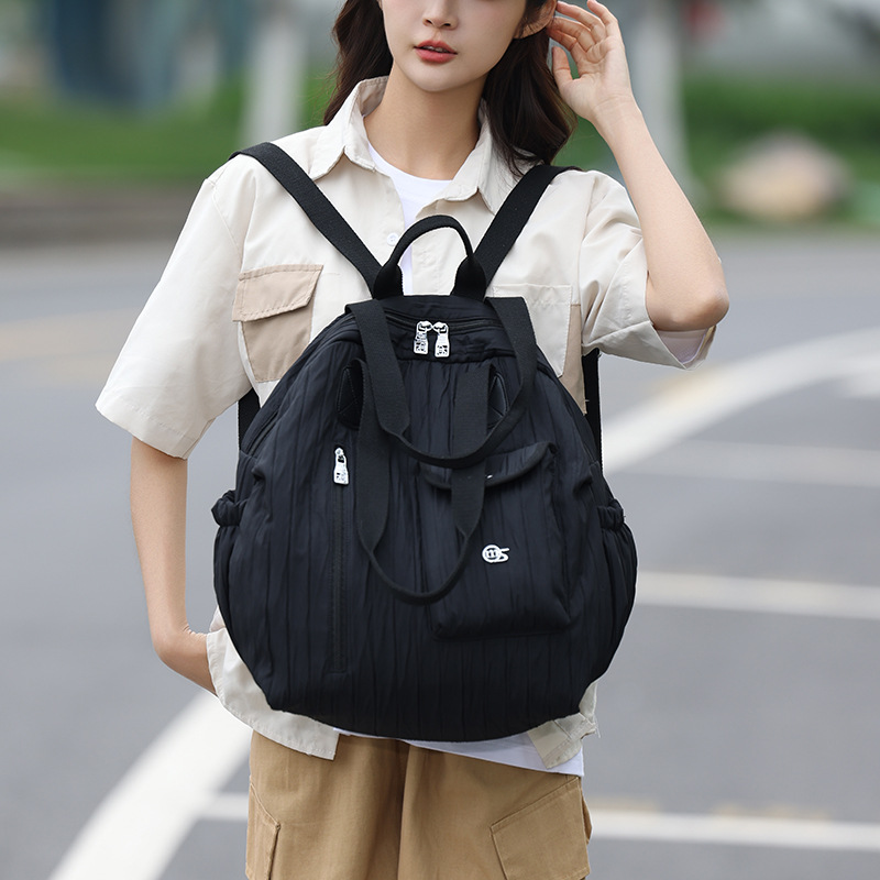 A new Korean-style Instagram backpack with a high aesthetic level, featuring a casual, simple and lightweight design for couples and a large capacity for travel details Picture