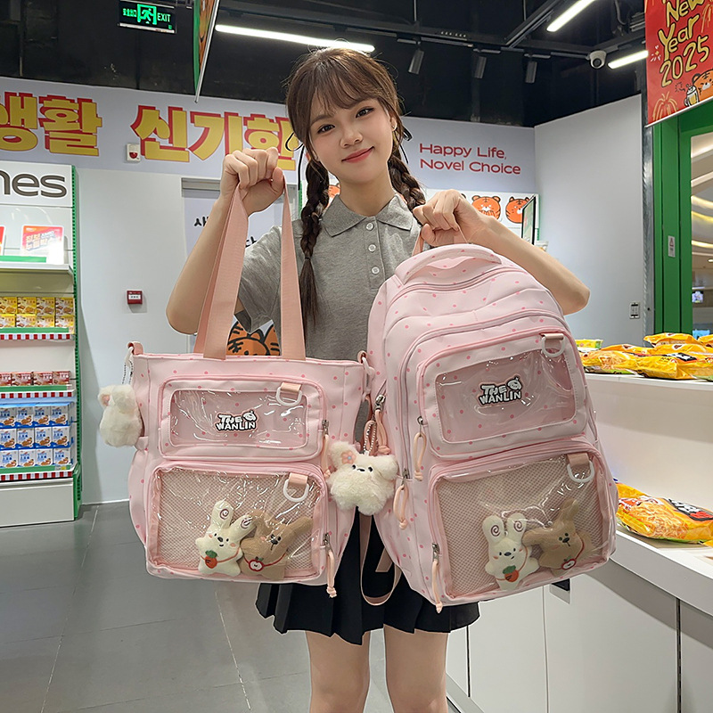 A new Japanese-style handbag with a high level of appearance, sweet and cute, and a large capacity. It is a lightweight backpack for junior and senior high school students full figure