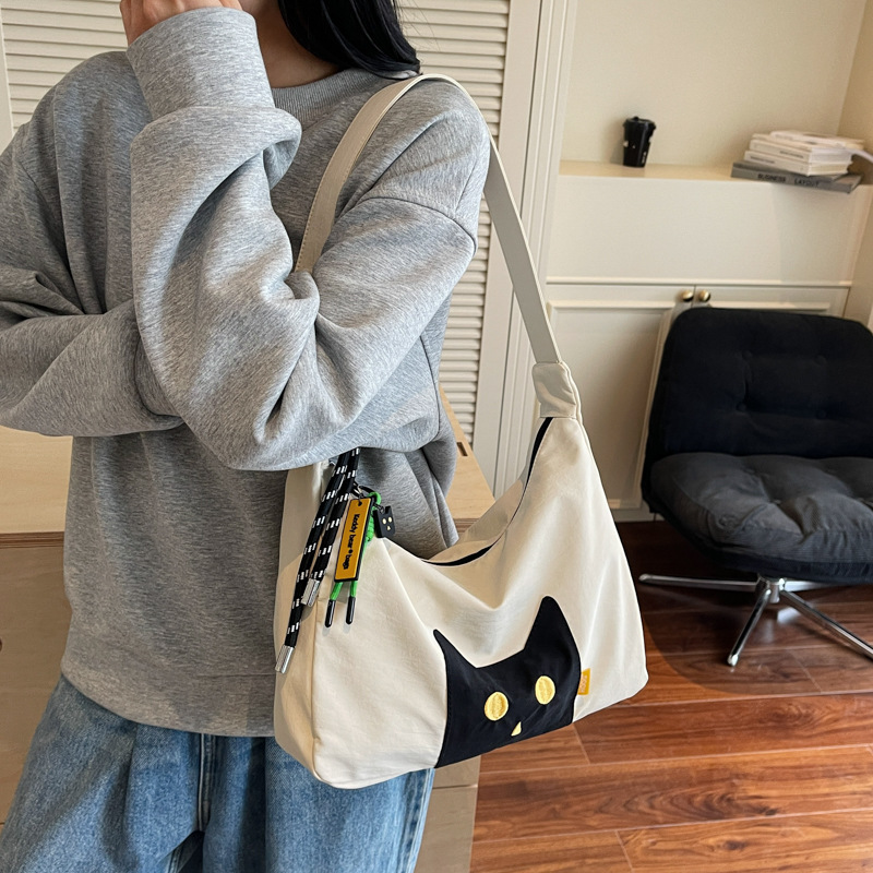 The new Japanese-style cute cat tote bag with a high-end feel is a casual, simple, lightweight and versatile crossbody bag for commuting details Picture