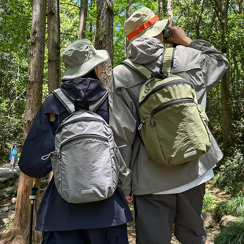 A new high-appeal mountain-themed Instagram multi-pocket solid-color drawstring large-capacity backpack for mountain climbing and travel full figure