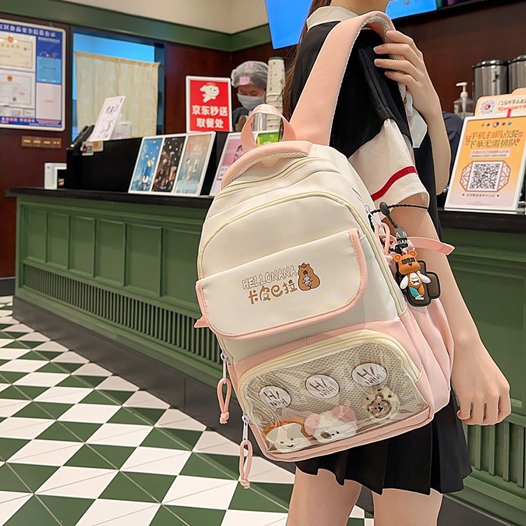 A new high-appeal, fresh and cute Capibara pattern backpack for junior and senior high school girls, a lightweight and large-capacity backpack full figure