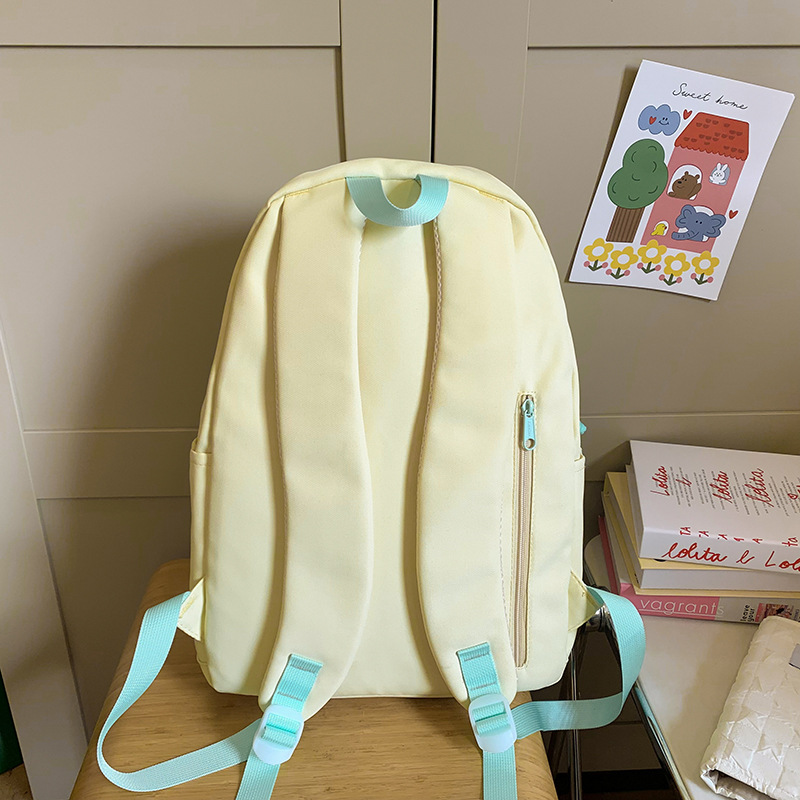 A simple and versatile schoolbag for female college students, a lightweight backpack for commuting, a Korean version of a casual backpack for junior and senior high school students Specification drawing